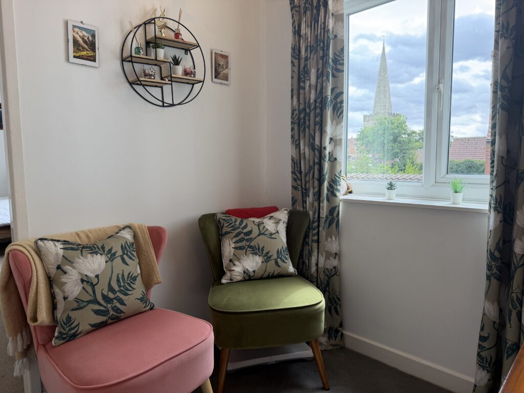 Cosy reading snug with games console